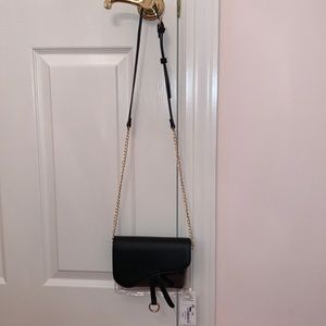 Black and clear cross body bag